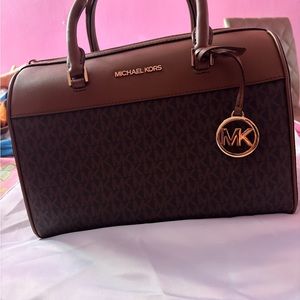 Michael kors brown purse with dust bag and strap